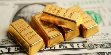 Ons-altin-fiyatlari-zirveye-tirmaniyor-Dolar-neden-geriliyor